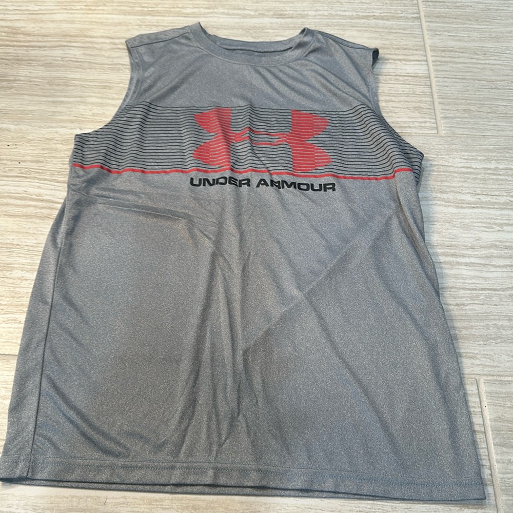 Under Amoure Sleeveless Top
Youth size Large
Kids Under Amoure